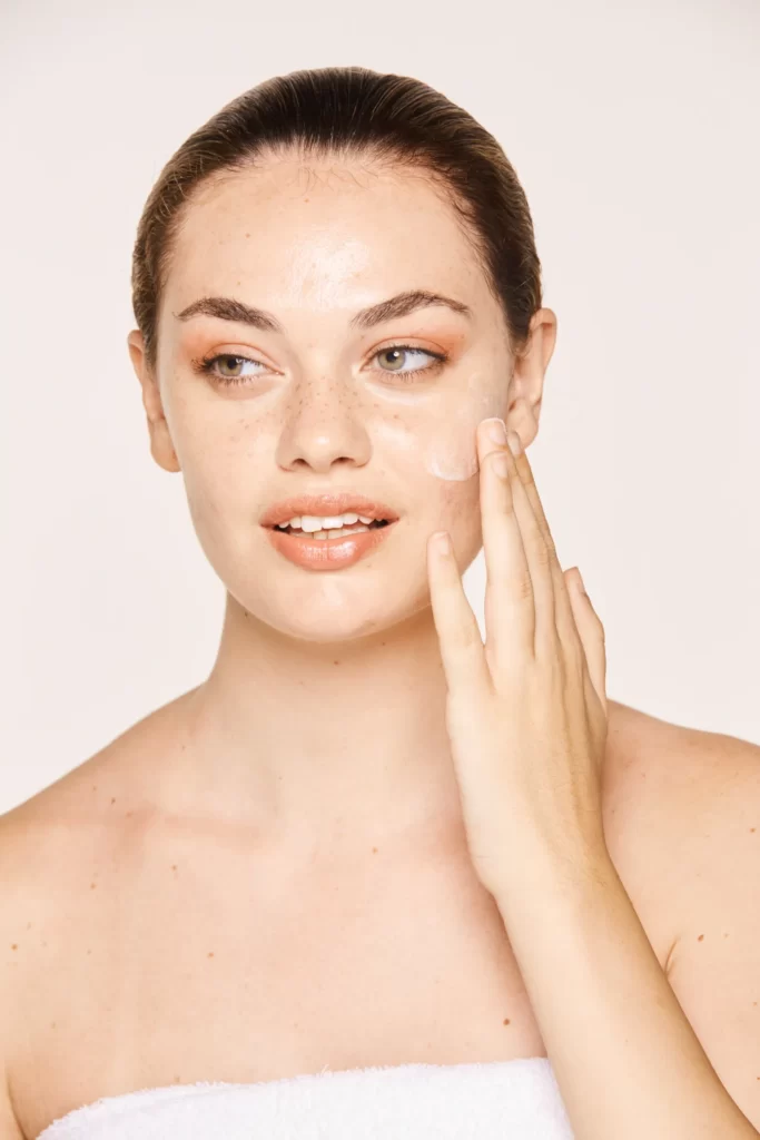 amiable female taking care of face utc