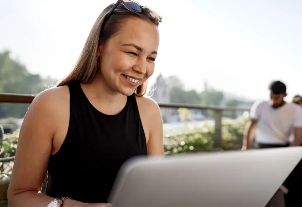 young blonde businesswoman using laptop working at utc